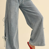 DENIM TIED ON THE SIDE PANTS