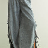 DENIM TIED ON THE SIDE PANTS